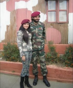 Celina Jaitly Instagram - #armyday Families serve too, just without medals.

This photo was taken on one of my visits to Bhai’s unit in the valley. He had just returned from a long mission. For this photo, one of the officers who was martyred shortly after this photo on a mission, placed his own para beret on my head. Wearing it, I told him there was nothing in my life I had done to earn it, not even as the sister of a Para officer. He smiled & said, “Ma’am, our families stand behind us & pay an equal price of bravery while we stand at the front.”

Today, I share a letter bhai wrote to me in 2000. I chose this letter because it captures something profound, the mindset of a young boy, newly out of school, already born to serve his country.

He had just entered #fauj through the technical entry after school. After 12th, he was selected to study Engineering at the Military College of Telecommunication Engineering, Mhow, often regarded as the IIT equivalent of the Indian Armed Forces. In those days, technical entry cadets were required to spend a year at #ima , Dehradun.

He was barely 18 plus, playful, trying to hook me up too 😁 yet already carrying responsibility & purpose. This letter reflects a boy who had accepted that his life belonged to the nation, even as he had just left home.

Maj Vikrant is a 4-gen soldier, born, as we say in our family, with ammunition boots on his feet. Even in those early letters, he worried about me, our parents, our home. Behind every soldier is a village bound to him by love sacrifice silent endurance 

In our case, most of that village is gone. What remains are empty halls of a house once full of life with our parents, Colonel Jaitly (SM), & our Ma, Dr. Meeta my brother & our 2 dogs, Scooby & Muffin. As I return 15 years later I write this from those empty halls & a heart full of memories of what was, of what continues to give me courage.

As written in that letter, Bhai went on to live the dream. He served with 3 Para SF, earned the Chief of Army Staff’s Commendation Card, & served with UN peacekeeping forces in Lebanon. This letter reminds me that a soldier is forged long before the uniform, long before the medal, & long before the battlefield.