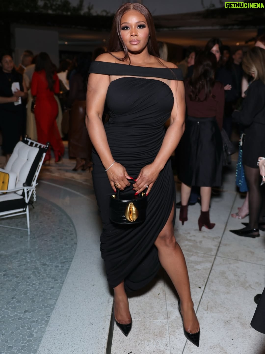 Claire Sulmers - 27K Likes - Last night, celebrated the finalists of @fashiontrustus alongside @waymanandmicah, Proud #FashionTrust Patron @tindodjaghian, and more. @fashiontrustus is a 501(c)(3) nonprofit supporting U.S.-based emerging fashion designers through mentorship and financial grants.

For the occasion, I wore pieces by designers you should know: @chatsbycdam and @fashionbombaccessories designer @florekny while #TinaOdjaghian rocked @driesvannoten and @hermes ! I’m all about supporting emerging designers, so I always love championing #fashiontrustus—and I can’t wait to toast the winners in April 🥂

📸: Getty / WWD
#clairesulmers #thebomblife 
*Thx @hannai_me