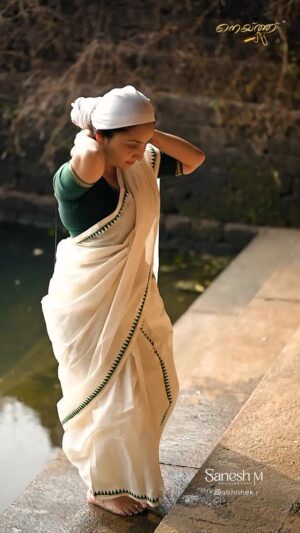 Nithya Das Instagram - 💐. Video: @saneshphotography 
Edit: @abhishek.r._ 
Costume: @naithubysruthiprasanth Saree draping: @maliniprajeesh