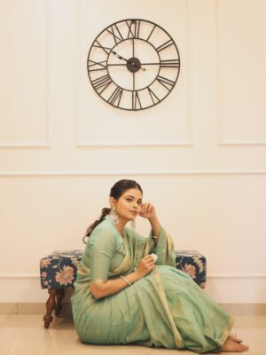 Priyanka Tendolkar Instagram - In love with this look..
.
.
Saree by @chhavi_drapedingrace 
.
Fabric: Silk Cotton Tissue – lustrous, airy & elegant
Border & Pallu Subtle zari detailing for a graceful finish with flowers motifs on pallu.

Clicked by @yogclicks 🤗
Hair by @its.alvina_ 😘

#chhavidrapedingrace #newcollection #uniquethreads staytuned maheshwari_saree