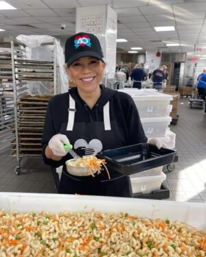 Rosie Perez Instagram - Okay. Hate the hair net by love that hat!! Volunteering at @godslovenyc today #WorldAidsDay2025! Such a loving and fun atmosphere here. Feels great. Especially on a tough day of Remembering so many loved ones who have gone too soon from this horrific disease. The volunteers at GLWD make the day so much easier. Please join us whenever you have a free moment to volunteer too. Just check their website. It’ll make you feel good inside as well. #UntilTheresACure ❤️❤️❤️