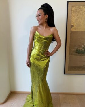 Ali Wong Instagram - 🙏 @grammys for the nomination 💚

Makeup @anthonyhnguyenmakeup 
Hair @claytonhawkins 
Styling @taraswennen 
Lewk @viviennewestwood @brandonblackwoodnyc @nicoleromanonyc @hanut101