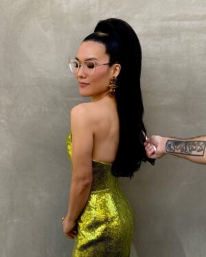 Ali Wong Instagram - 🙏 @grammys for the nomination 💚

Makeup @anthonyhnguyenmakeup 
Hair @claytonhawkins 
Styling @taraswennen 
Lewk @viviennewestwood @brandonblackwoodnyc @nicoleromanonyc @hanut101
