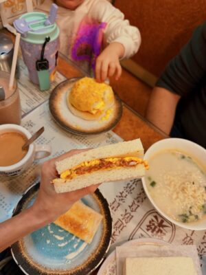 Alyssa Campanella Instagram - Slow mornings and cha chaan tengs with my mini ☕️ Pineapple buns, ginger beef noodles, salted beef and egg sandwiches, and milk toast with condensed milk - with a cup of hot HK milk tea to warm up on these cold mornings (hot chocolate for little bean).
#chachaanteng #hkcafe #hongkongcafe #sheungwan #hongkongfood