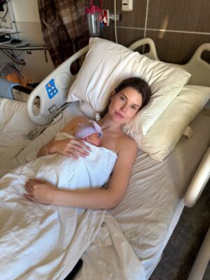 Amanda Cerny Instagram - We are over the moon to officially introduce you to Klaus and Annabelle 🩷💙💐 - love always, Mama and Papa 🥰😍🎉