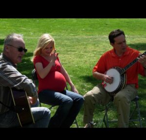 Angela Kinsey Instagram - As discussed on today’s 2nd Drink of Job Fair on @officeladiespod … 

I wish I still had the song that Ed & Creed sang for me and my baby girl. They improvised the sweetest melody. I think it exists in some old NBC archives of “Adventures with Angela” but I’m so thankful to have these pictures from that day. 

Our Office Family memories are so special to me! ❤️ 

Love ya @creedbratton & @edhelms !