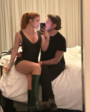 Bella Thorne Instagram - My forever valentine & partner for life ❤️ to many, many more, love you forever 🥂