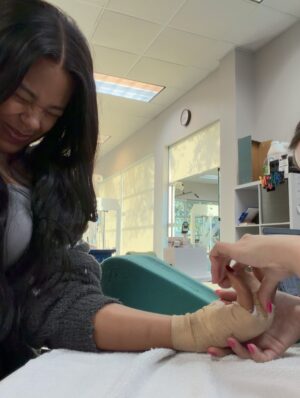 Bianca Crawford Instagram - 10 months post injury, 8 months of rehab, 5 Dr’s Later…
And we are FINALLY here.
Now I can finally start to put this behind me.
Thank you so much @dr.karandesai for hearing me and fixing me!

Fingers and JOINTS are complicated, frustrating, confusing, essential… if you don’t get it… consider yourself lucky and I hope you never have to find out. 
Maybe one day I’ll go into detail but it’s a lot.

Thank you to those who have sent so much love my way and continue to.
💋

*Graphic photo from surgery… I was going to post the video but it was a little more graphic than the photo and I didn’t want to freak out some people too badly lol*
