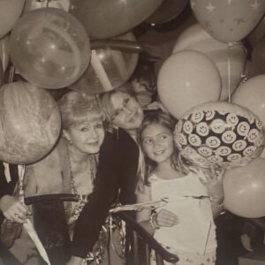 Billie Lourd Instagram - ♊️🅰️🅰️My mom would’ve been 69 years old today. Which still feels shockingly young because this is the 9th birthday of hers I’ve “celebrated” without her. It feels like she has been dead so long that she should be 100 at this point? It feels more okay for a 100 year old person to be dead? But not a 69 year old. Every time I meet someone older than her I’m secretly jealous. Why couldn’t she have lived as long as they have? Anyone out there who has lost a loved one too young can maybe relate? So I can’t really call it a wholly happy birthday cause she isn’t here to enjoy the happy. She never got to meet her grandchildren and see them grow into the magical smart hilarious kind creatures they are today. The other night my son asked me how she died - I told him that she didn’t take care of her body - telling him the truth without telling him the whole truth. “Oh but I take care of my body!” Yes I replied, “Yes you do! And I do too and daddy does too!” Death isn’t looming at our doorsteps the way it always was for her. That’s a conversation for later years. He didn’t push me for more answers so we left it at that. But it broke my heart. And made me mad at her. It’s weird being mad at a dead person because you don’t really have anywhere to put the emotion. But it’s still there and I’ve had to learn to allow myself to feel all the things - mad at her for not getting sober but also sad for her that she wasn’t able to get sober but also happy that she existed at all. So I allowed myself to be mad for a moment but then realized I also do want her birthday to have some happy in it. Especially for my kids. She was a brilliant magical human and I want them to know that. So despite the many emotions I have on these days I try to celebrate the good parts. I’ll tell my kids funny stories about her, watch one of her movies, eat one of her favorite foods, have a Coke with a shit ton of ice. Grief is a weird soup of feelings and there are a lot of ingredients in it that are hard to swallow, but ultimately I think the soup has made me healthier - more cognizant of how short life is and more appreciative of all the happy in my life. (Continued in comments cause I talk too much?)