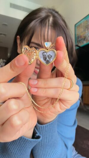 Cynthia Samuel Instagram - I will carry you in my ❤️ forever Dad. 
My husband got me the most beautiful gift that i will cherish for eternity 🩷🦋

Created by: @donnahouranijewelry ✨
#jewelry #heirloom #heartlocket