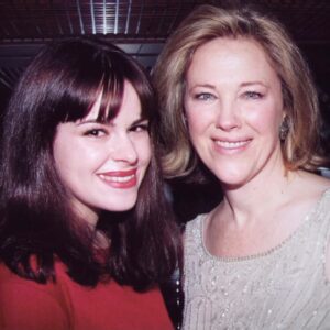 Emily Hampshire Instagram - I find this impossible to believe. There was no one more alive than Catherine. She filled every moment with more life than most of us expend in days.
I was lucky enough to work with her at the beginning of my career. She was just as kind and generous then as she was after six years of working together on Schitt’s. That’s simply who she was with everyone.
So pathologically kind and generous that it inevitably seeped into her characters. I think that’s why you can’t help but love Moira’s blind narcissism—it’s carried by something deeply human underneath.
I remember the scene where Moira sends Stevie off to sing her big number in Cabaret. It was originally written in classic Moira-isms, but Catherine wanted to make it more specific and truthful, so she rewrote it to say, “you are very very cool.” She elevated everything.
I cherish every moment I had with her. I will miss her laugh most of all. My heart goes out to Bo, Matthew, Luke, and every member of her family.