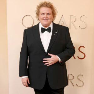 Fortune Feimster Instagram - Had the pleasure of going to the Oscars as part of Zootopia 2. A first for me in the 20 years I’ve been at this. So grateful to be a part of such a beautiful movie that has given me many incredible experiences. 

Suit @giorgioarmani 
Jewelry @leightonjewels 
Stylist @lindamedvenestyling 
Makeup @jamiemakeup
Hair @kathkous