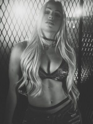 Gionna Daddio Instagram - THE Liv Morgan 🖕✨

📸: @redlight24fps