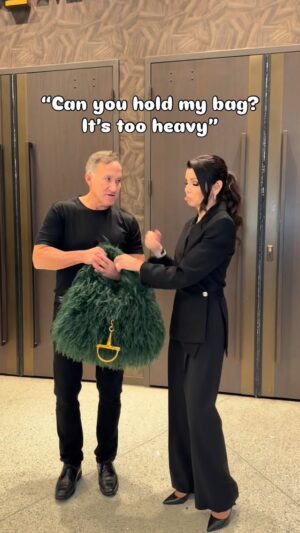 Heather Dubrow Instagram - Find yourself a man who will carry your bag and not complain 🤣🤷🏻‍♀️👜❤️

Bag: @gucci 
Set: @loewe 

#couplescomedy #coupleslove #husbandwifecomedy #husbandwifelove #guccipurse