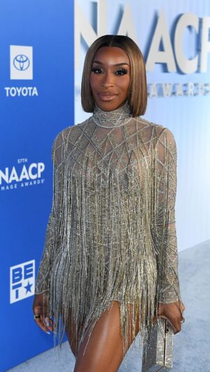 Jackie Aina Instagram - shining like a starrrr at the @naacpimageawards wearing @tonywardcouture ✨