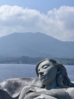 Kiko Mizuhara Instagram - I feel truly honored to have been part of this very special project — the creation of Ocean Gaia, an underwater sculpture by Jason Decaires Taylor @jasondecairestaylor , now resting in the beautiful ocean of my beloved Tokunoshima 🌊🤍

This project has been in the making for nearly two years. So many hearts, hands, and hopes came together to bring this vision to life.

The sculpture lies gently on the seabed, just a short distance from the shore, at a depth of 5 meters.
It was created in the image of my calm expression, standing 2 meters tall, 5.5 meters wide, and weighing 45 tons — the very first large-scale underwater sculpture ever installed in Japan.

As part of the coral reef, the piece features openings that allow fish and other marine life to move freely in and out, making it not only a work of art but also a new home for the ocean’s ecosystem.
Its soft, swirling form was inspired by the intricate sand patterns created by Amami Hoshizara puffer fish🐡, as well as the gentle curves of the island’s mountain range.

Tokunoshima is known for its longevity, vibrant birth rate, and deep connection to nature.
The mountain ridge at the island’s center resembles the silhouette of a pregnant woman — a symbol of life itself. Ocean Gaia was born from the Gaia myth, embodying the bond between people and the sea, and celebrating the cycle of life 🌿

As more young people leave the island for the cities, my hope is that this piece will spark a renewed connection to the ocean, nature, and culture for the next generation. And maybe, it will inspire more people to fall in love with the sea and look more closely at the natural world around us ❤️

Being underwater and seeing Ocean Gaia for the first time as it began to breathe with the ocean was unforgettable — a truly special birthday memory I’ll carry with me forever.

I can’t wait to watch how this sculpture slowly becomes part of the reef, a home for coral and marine life, and how its story will be woven into the ocean over time 🌊✨

Thank you from the bottom of my heart to everyone in Tokunoshima.