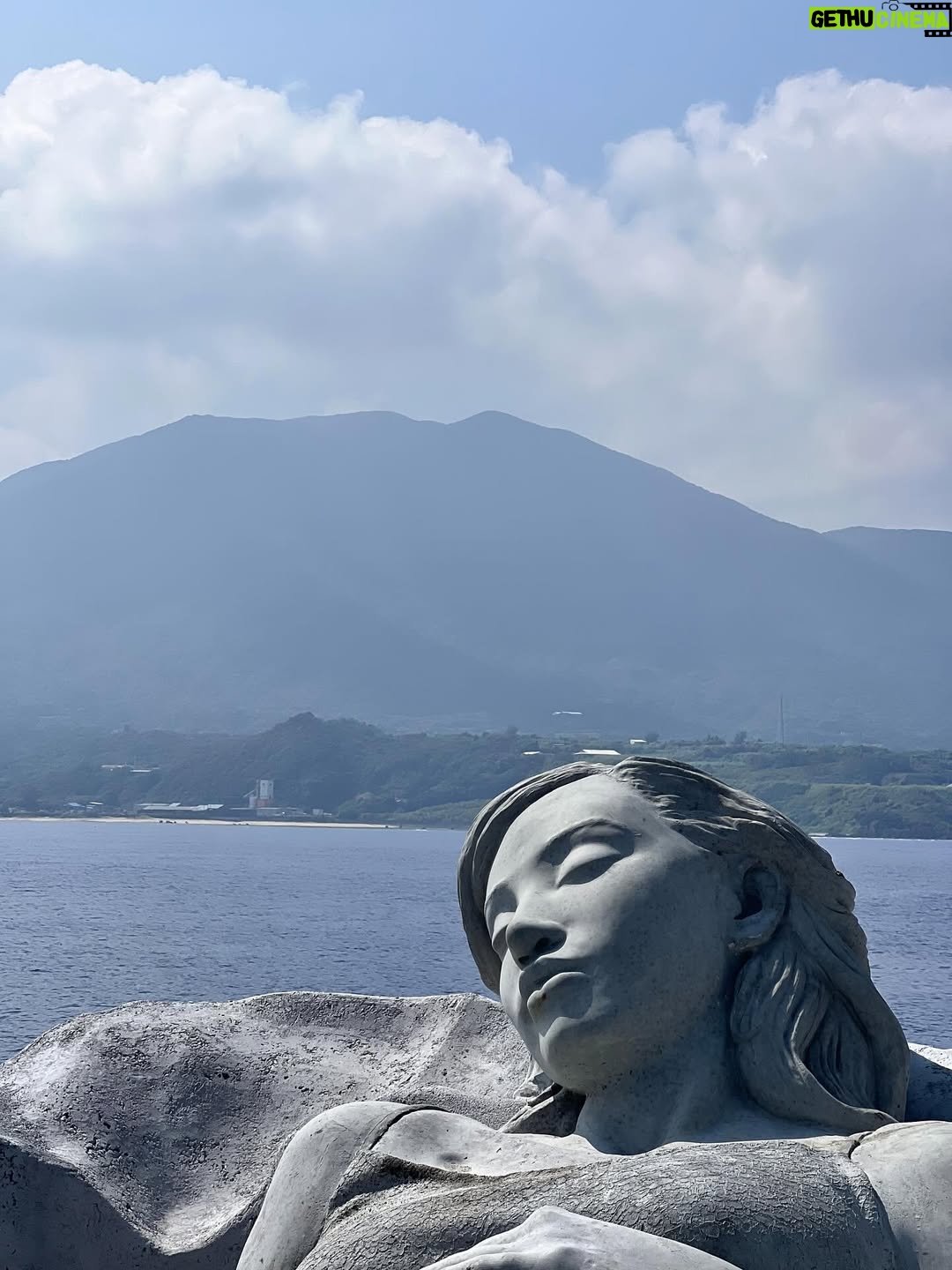 Kiko Mizuhara - 327.2K Likes - I feel truly honored to have been part of this very special project — the creation of Ocean Gaia, an underwater sculpture by Jason Decaires Taylor @jasondecairestaylor , now resting in the beautiful ocean of my beloved Tokunoshima 🌊🤍

This project has been in the making for nearly two years. So many hearts, hands, and hopes came together to bring this vision to life.

The sculpture lies gently on the seabed, just a short distance from the shore, at a depth of 5 meters.
It was created in the image of my calm expression, standing 2 meters tall, 5.5 meters wide, and weighing 45 tons — the very first large-scale underwater sculpture ever installed in Japan.

As part of the coral reef, the piece features openings that allow fish and other marine life to move freely in and out, making it not only a work of art but also a new home for the ocean’s ecosystem.
Its soft, swirling form was inspired by the intricate sand patterns created by Amami Hoshizara puffer fish🐡, as well as the gentle curves of the island’s mountain range.

Tokunoshima is known for its longevity, vibrant birth rate, and deep connection to nature.
The mountain ridge at the island’s center resembles the silhouette of a pregnant woman — a symbol of life itself. Ocean Gaia was born from the Gaia myth, embodying the bond between people and the sea, and celebrating the cycle of life 🌿

As more young people leave the island for the cities, my hope is that this piece will spark a renewed connection to the ocean, nature, and culture for the next generation. And maybe, it will inspire more people to fall in love with the sea and look more closely at the natural world around us ❤️

Being underwater and seeing Ocean Gaia for the first time as it began to breathe with the ocean was unforgettable — a truly special birthday memory I’ll carry with me forever.

I can’t wait to watch how this sculpture slowly becomes part of the reef, a home for coral and marine life, and how its story will be woven into the ocean over time 🌊✨

Thank you from the bottom of my heart to everyone in Tokunoshima.