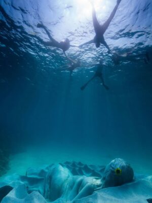 Kiko Mizuhara Instagram - I feel truly honored to have been part of this very special project — the creation of Ocean Gaia, an underwater sculpture by Jason Decaires Taylor @jasondecairestaylor , now resting in the beautiful ocean of my beloved Tokunoshima 🌊🤍

This project has been in the making for nearly two years. So many hearts, hands, and hopes came together to bring this vision to life.

The sculpture lies gently on the seabed, just a short distance from the shore, at a depth of 5 meters.
It was created in the image of my calm expression, standing 2 meters tall, 5.5 meters wide, and weighing 45 tons — the very first large-scale underwater sculpture ever installed in Japan.

As part of the coral reef, the piece features openings that allow fish and other marine life to move freely in and out, making it not only a work of art but also a new home for the ocean’s ecosystem.
Its soft, swirling form was inspired by the intricate sand patterns created by Amami Hoshizara puffer fish🐡, as well as the gentle curves of the island’s mountain range.

Tokunoshima is known for its longevity, vibrant birth rate, and deep connection to nature.
The mountain ridge at the island’s center resembles the silhouette of a pregnant woman — a symbol of life itself. Ocean Gaia was born from the Gaia myth, embodying the bond between people and the sea, and celebrating the cycle of life 🌿

As more young people leave the island for the cities, my hope is that this piece will spark a renewed connection to the ocean, nature, and culture for the next generation. And maybe, it will inspire more people to fall in love with the sea and look more closely at the natural world around us ❤️

Being underwater and seeing Ocean Gaia for the first time as it began to breathe with the ocean was unforgettable — a truly special birthday memory I’ll carry with me forever.

I can’t wait to watch how this sculpture slowly becomes part of the reef, a home for coral and marine life, and how its story will be woven into the ocean over time 🌊✨

Thank you from the bottom of my heart to everyone in Tokunoshima.