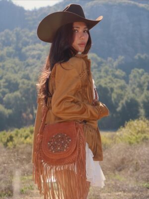 Linzy Luu Instagram - Cowgirl at heart 🤎 Boots that wander and a fringe bag that keeps up with me — @myrabag ໋𐚁 ⋆ ℧