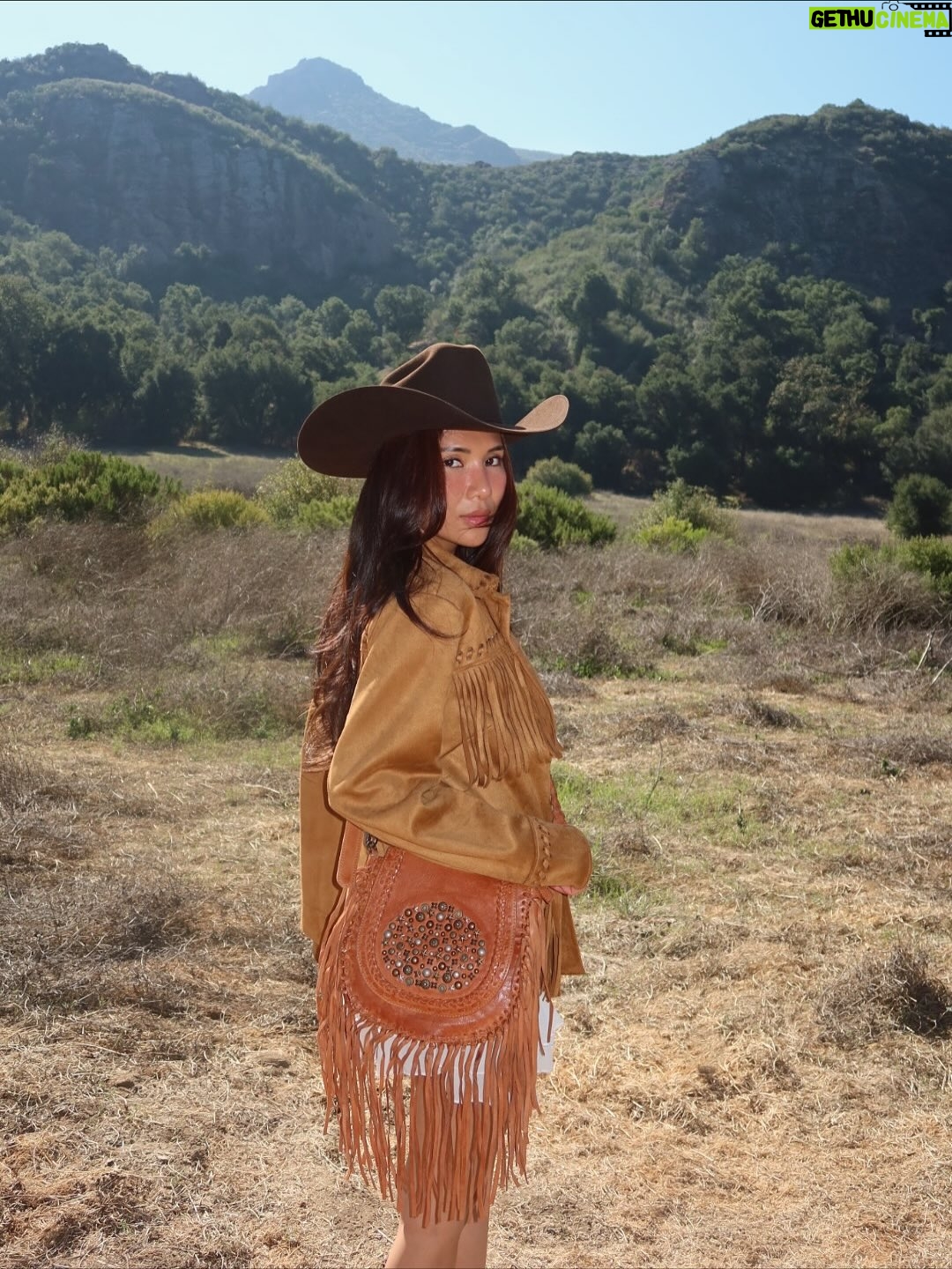Linzy Luu - 5.9K Likes - Cowgirl at heart 🤎 Boots that wander and a fringe bag that keeps up with me — @myrabag ໋𐚁 ⋆ ℧