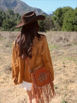 Linzy Luu Instagram - Cowgirl at heart 🤎 Boots that wander and a fringe bag that keeps up with me — @myrabag ໋𐚁 ⋆ ℧