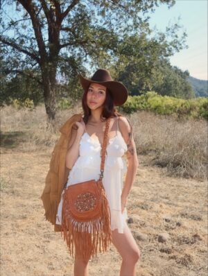 Linzy Luu Instagram - Cowgirl at heart 🤎 Boots that wander and a fringe bag that keeps up with me — @myrabag ໋𐚁 ⋆ ℧