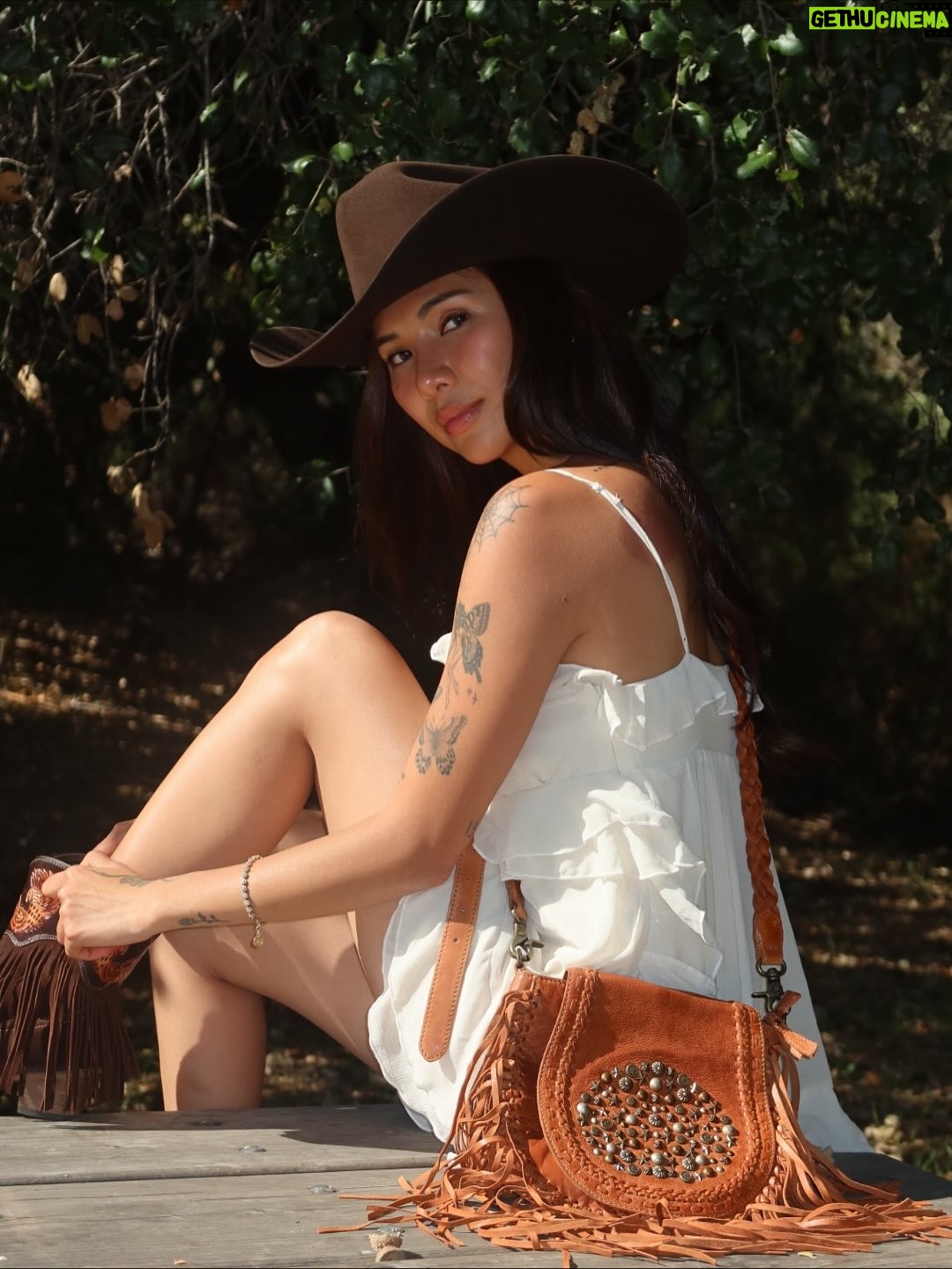 Linzy Luu - 5.9K Likes - Cowgirl at heart 🤎 Boots that wander and a fringe bag that keeps up with me — @myrabag ໋𐚁 ⋆ ℧