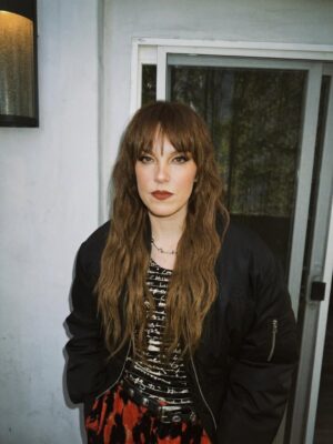 Lzzy Hale Instagram - International women’s Day.
I live this every day. I understand every second what it means to be a woman forging her own path. I’ve been on my path since my epiphany in 1997. The fire was lit, and I had no idea what was in front of me only that I had I primal need to see how far I could take it. It’s been many seasons since then, seasons of indescribable joy, and devastating lows. But through all of this one thing remains constant. I am the only one that will ever be in my way, and no matter how dark the world gets there is always a space for a candle to burn. I’m so proud of my fellow women in this industry and Anyone who chooses to be their truest self regardless of being misunderstood or not fitting into a box. Life is not kind, you create kindness in the madness, and with these small acts of just existing authenticity, we hold the gate open and  create a safer, more accepting existence for those who dare to walk through after us. Our simple, yet monumental responsibility is to hold the torch for as long as we possibly can and pass it on.  I love you. I see you. I hear you. I feel you… and I’m fighting for US. 

-Lzzy Hale