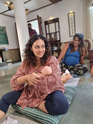 Nithya Menen Instagram - Some behind the scenes stuff I had from the shoot. Miss the crazy group - the girls all crammed into one room , which also doubled as the costume room . The boys so afraid to enter that room always :D ‘My’ spot on the couch - which no one sat on ever 🤍:) The early early mornings - driving to location with @sayanoraphilip on most days before the sunrise…. Music on sets always.  But most importantly ,no make up no assistants.. Just a happy bunch , having a lot of fun together.
@wonderwomenfilm @anjalimenonfilms @simply.nadiya @par_vathy @padmapriya_off @sayanoraphilip @archana_padmini @amrutasubhash @_its_me_caroline