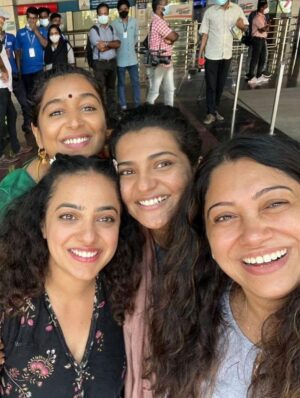 Nithya Menen Instagram - Some behind the scenes stuff I had from the shoot. Miss the crazy group - the girls all crammed into one room , which also doubled as the costume room . The boys so afraid to enter that room always :D ‘My’ spot on the couch - which no one sat on ever 🤍:) The early early mornings - driving to location with @sayanoraphilip on most days before the sunrise…. Music on sets always.  But most importantly ,no make up no assistants.. Just a happy bunch , having a lot of fun together.
@wonderwomenfilm @anjalimenonfilms @simply.nadiya @par_vathy @padmapriya_off @sayanoraphilip @archana_padmini @amrutasubhash @_its_me_caroline