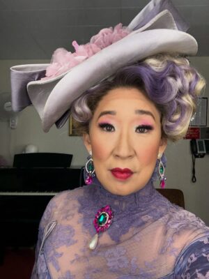 Sandra Oh Instagram - 3,2,1 - the Dutchess 💜🖤💜 Happy Halloween! 🎃👻🐈‍⬛
@metopera #LaFilleDuRegiment