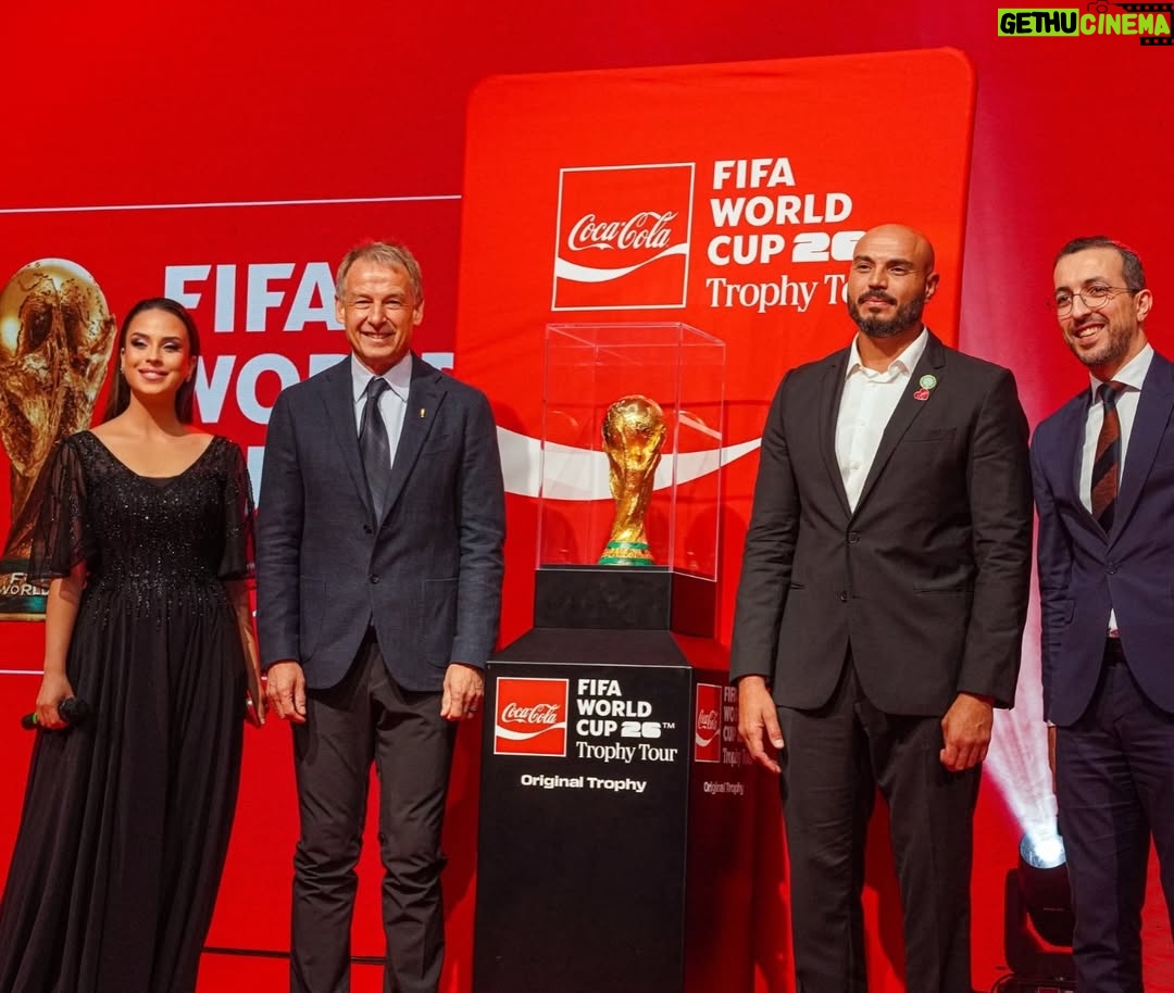 Sara Lalama - 3 Likes - I was proud and delighted to host the World Cup 2026 Trophy Tour event alongside the brilliant journalist Younes Saber Cherif . It was an honor to stand beside the legendary Jürgen Klinsmann and in front of such distinguished personalities. Thank you to everyone who worked behind the scenes to make the evening run so perfectly🏆🇩🇿

Dress: @feemina_robes 
Photo: @malkismail_