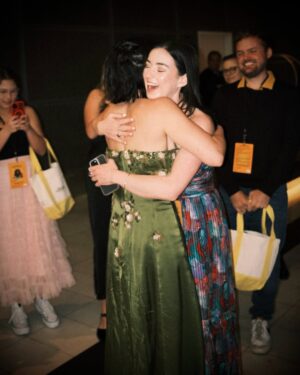 Sarah Gilman Instagram - piper did do it, and i got to celebrate her. iykyk. it was a beautifully full circle moment watching pipes dominate the world premiere red carpet at El Capitan this week for her new Pixar movie Hoppers. 

a decade ago, we walked the same carpet to the same theater. lucky and grateful and stressed go to premieres we left like charity invites for - disney channel kids that no one knew on a show that not may seemed to care about, just trying to take up a little bit of space—racked with the insecurity of awkward teens trying to grow up in young hollywood, navigating the nascent social media boom. having piper by my side in those lonely moments, just fully getting it, kept me afloat through the lows of it all. helped me stick around for all the good that was yet to come, and to recognize the amazing opportunity we found ourselves in.

so to fast forward to this weekend and to see pipes strut and own this night was a healing moment i didn’t know i needed. maybe one that we both needed. 

i love you piper, you timeless soul and i’m so so happy for you and the adventures and jobs to come. through the highs and the lows, and all the haircuts, thank you for always saving me a seat at your table. you always have a spot at mine. ❤️🦫🪵🦎

📸 beautiful photos of the Disneyland day and premiere night by @kalivphoto