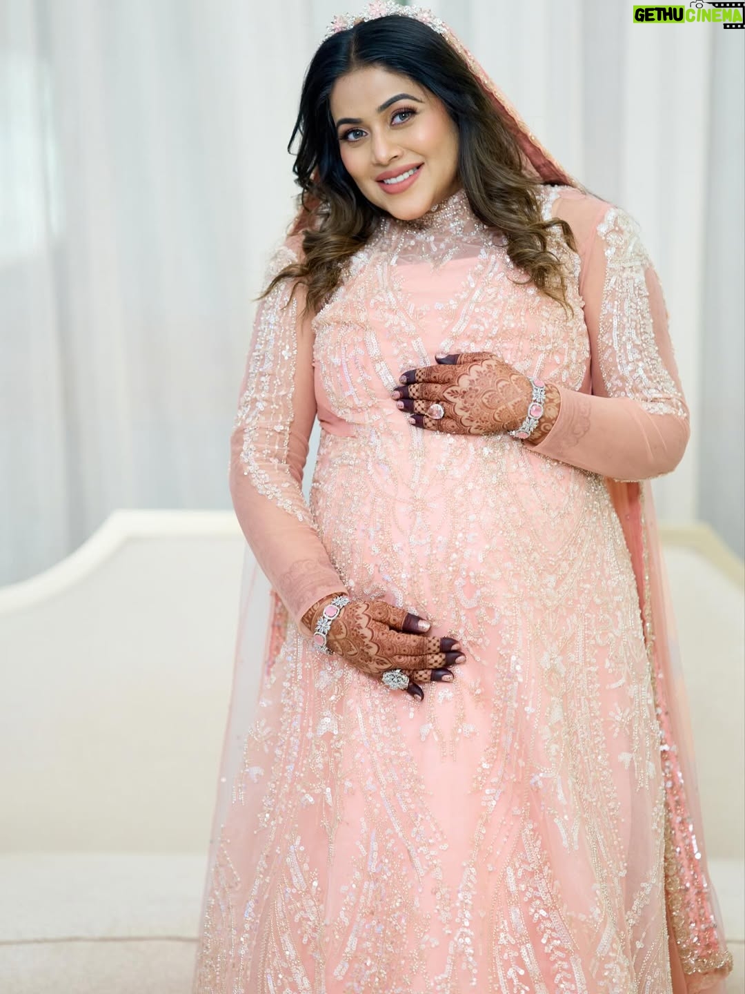 Shamna Kasim - 181.5K Likes - A gown…
gifted as a memory
of the day he first said
“I love you.”

For years,
it slept quietly in the cupboard,
waiting for celebrations.

Today,
at the celebration
of my motherhood,
it smiled once again ✨

To my beloved husband,
who held my hand
and made this day
more beautiful than a dream—
my heart is full of gratitude
and endless love ❤️

To my dear children
from my dance school,
who spread happiness
with every step—
in each movement,
I feel my pride and joy 💃🌸

May this day
bloom forever
as flowers
in my memories ✨

#mother #pregnant #wife #actress #dancer