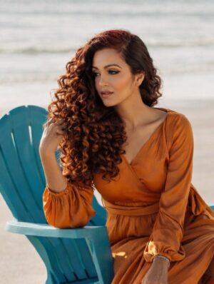 Sheena Chohan Instagram - Walking through the journey of life like tides along the shore,
grounded in the present, always ready to transform and explore. 🧡 
To live each moment fully, heart open and free —
that is where life unfolds for me. ✨

In that rhythm — whether it’s distant lands, stories on screen,
causes I cherish, or souls i dance with, in between ✨✨
giving my best to living every moment & scene,
is where I thrive, is where I’m most seen.😊

Always daring to evolve, to rise and refine,
to meet each new version of myself in time —
for transformation is the dance, and the journey divine!

Shot by 📸@chantalcobyatl 
Hair and makeup: Ashley Christine

#SheenaChohan  #JourneyOfLife #PresentMoment #TransformAndThrive #Actress Sheena
