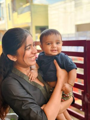 Shrinidhi Padmanaban Instagram - Everyone else is cute… but have you seen my annan magan? And his stages of the most wholesome smile🥹❤️ last picture has my whole heart 🧿